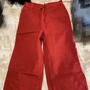 Red high waisted pants with wide legs